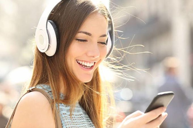 happy-girl-listening-music-with-headphones