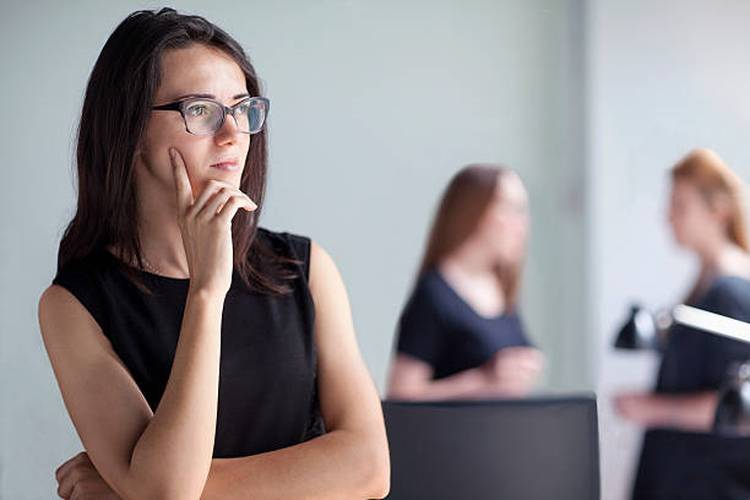 businesswoman-thinking-office