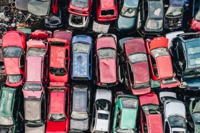 old-rusty-corroded-cars-in-car-scrapyard