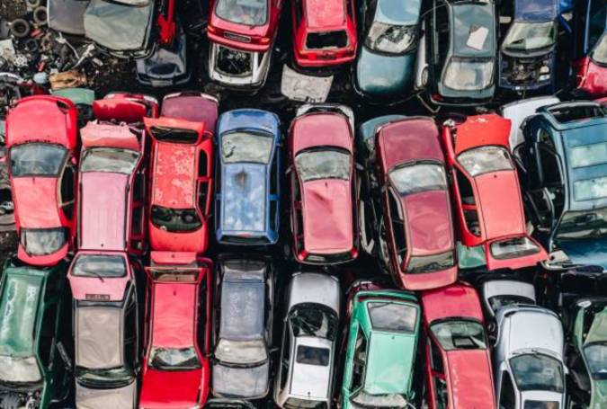 old-rusty-corroded-cars-in-car-scrapyard